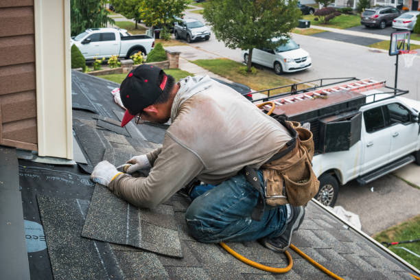 Professional Roofing technician working in Belleville, IL